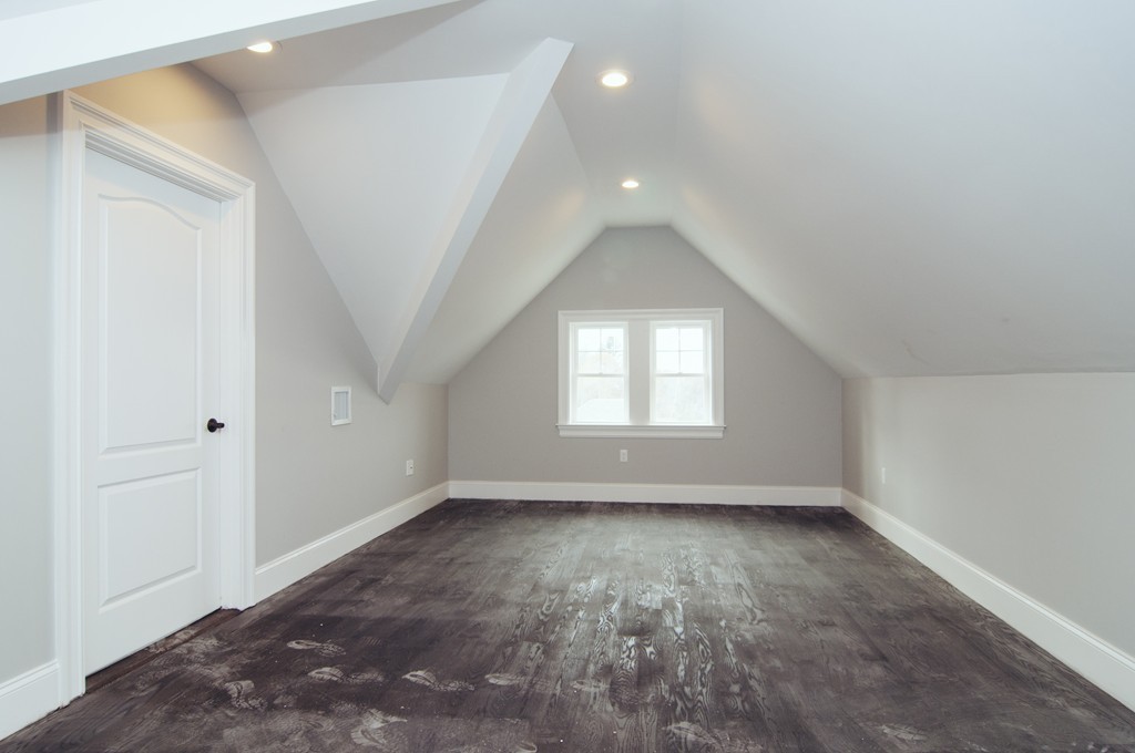 50 Beatrice Way Canton, MA 02021 - Photo 18 of 30 an empty room with wooden floor and windows