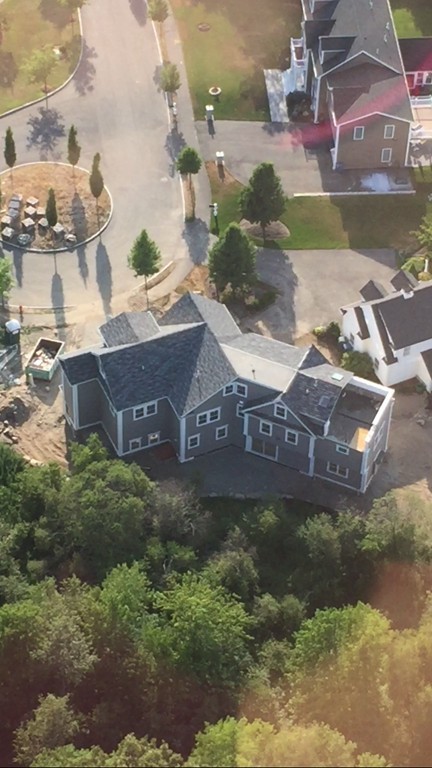 50 Beatrice Way Canton, MA 02021 - Photo 26 of 30 a sign that is sitting on a brick wall