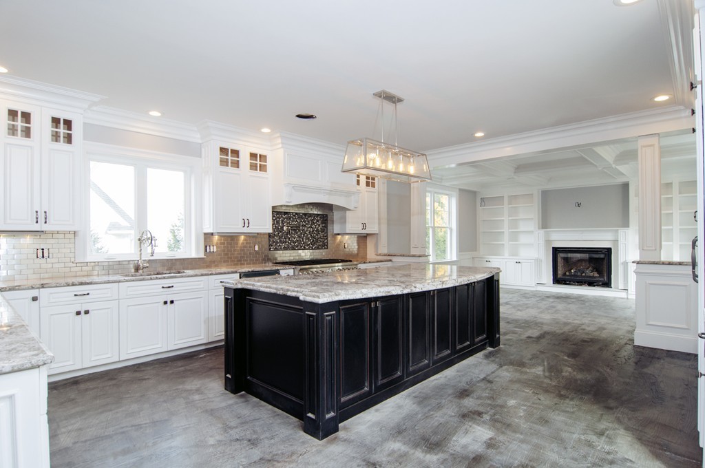 50 Beatrice Way Canton, MA 02021 - Photo 4 of 30 a kitchen with stainless steel appliances granite countertop a stove and a sink