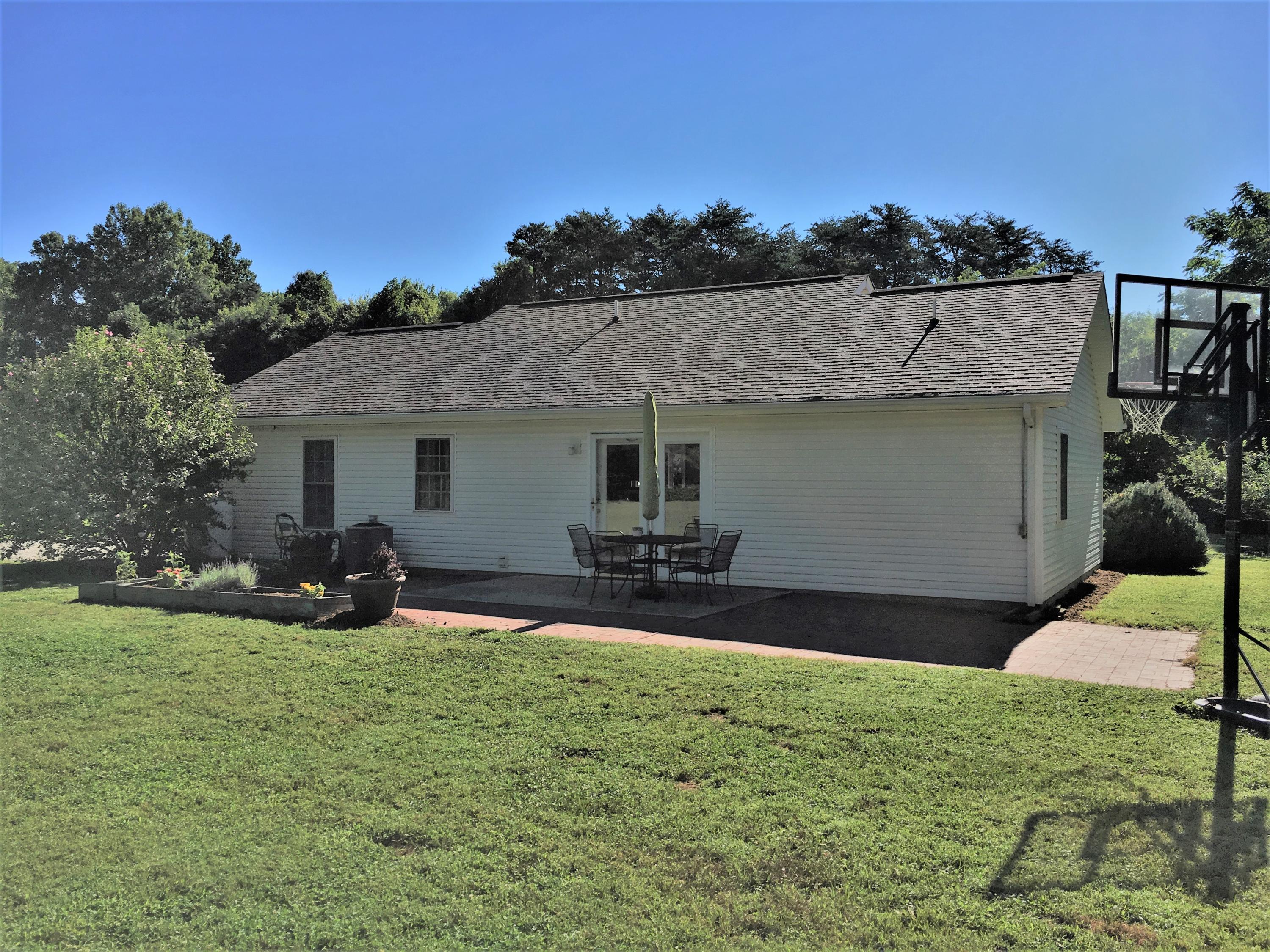 13543 Hardy Road Hardy, VA 24101 - Photo 18 of 24 front view of a house with a patio