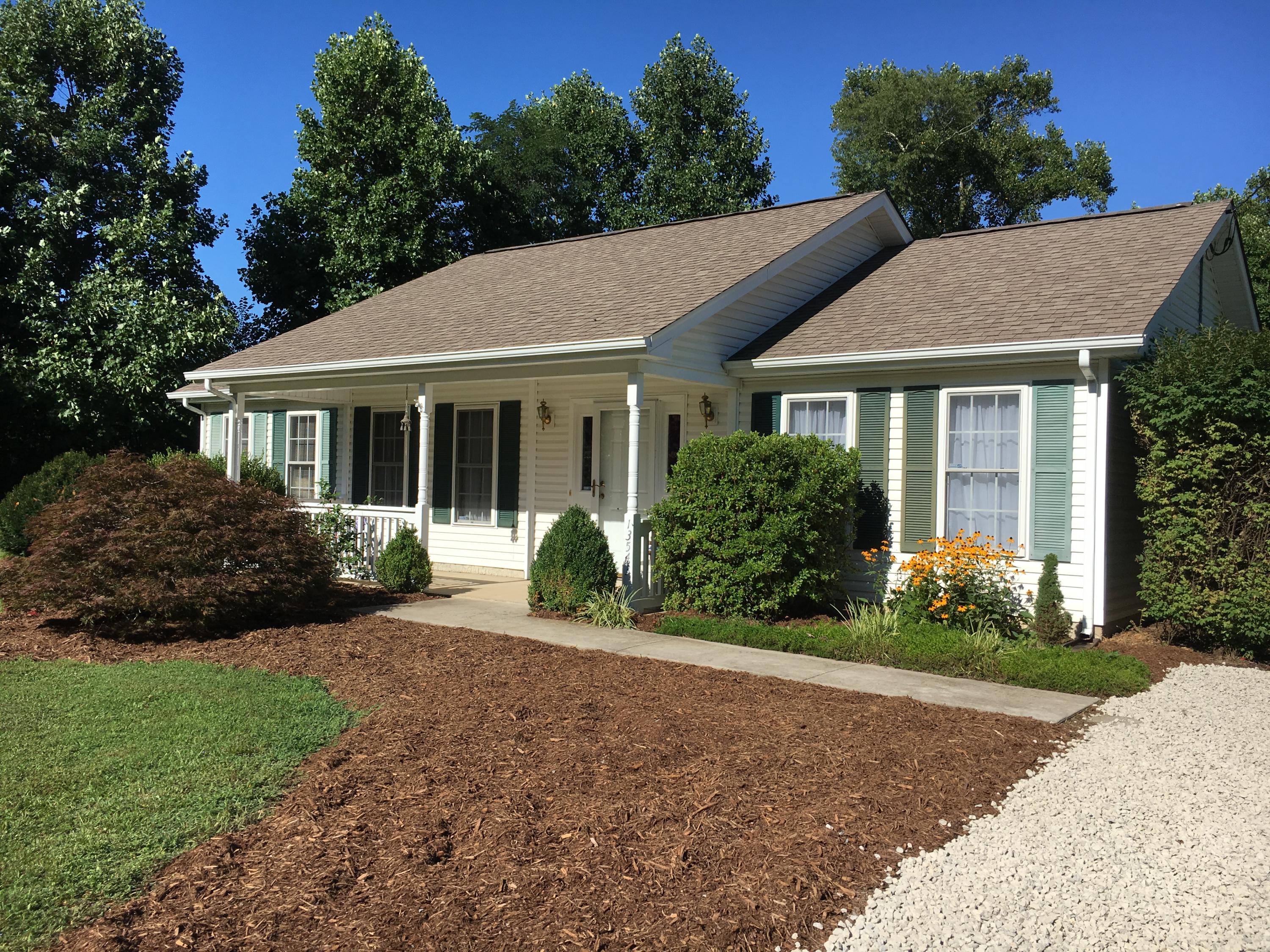 13543 Hardy Road Hardy, VA 24101 - Photo 3 of 24 a front view of a house with garden