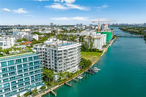 a view of a city with a lake