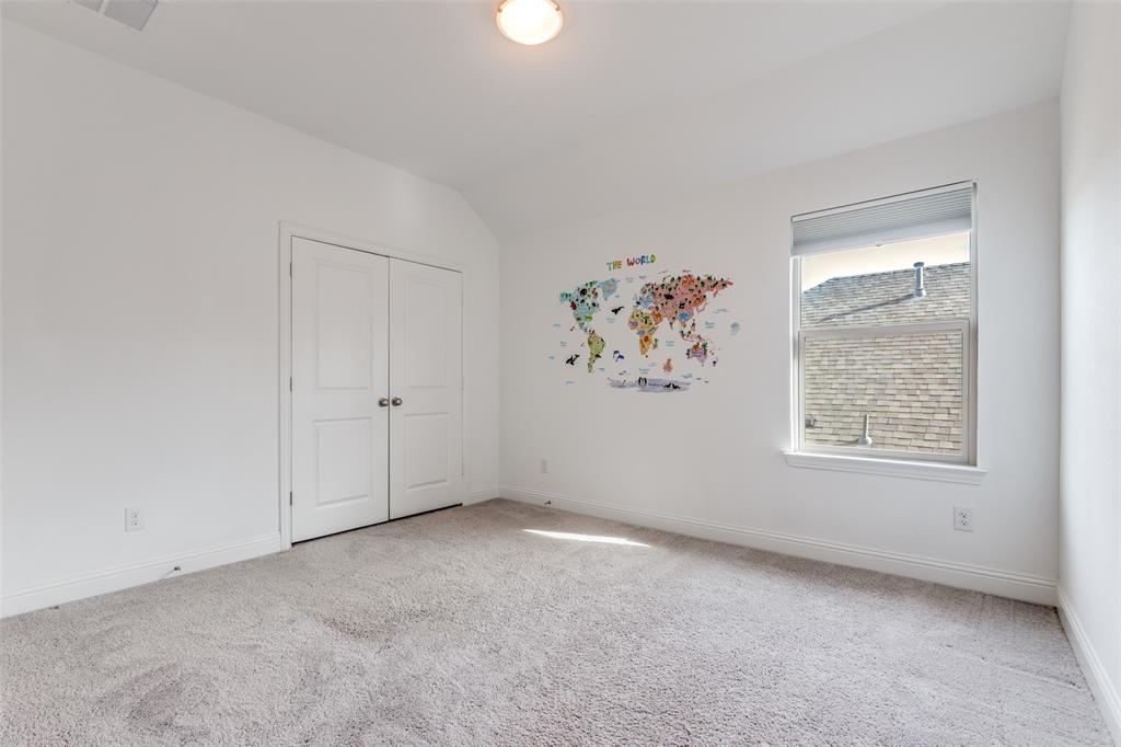 1400 Elizabeth Street Anna, TX 75409 - Photo 19 of 25 an empty room with a painting on the wall