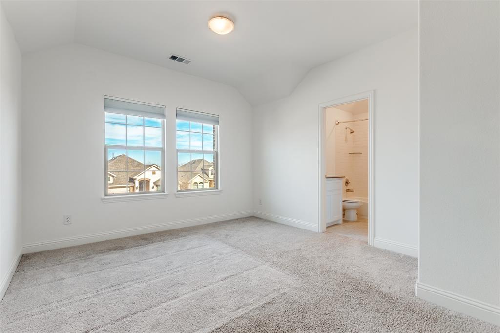 1400 Elizabeth Street Anna, TX 75409 - Photo 20 of 25 an empty room with windows and closet