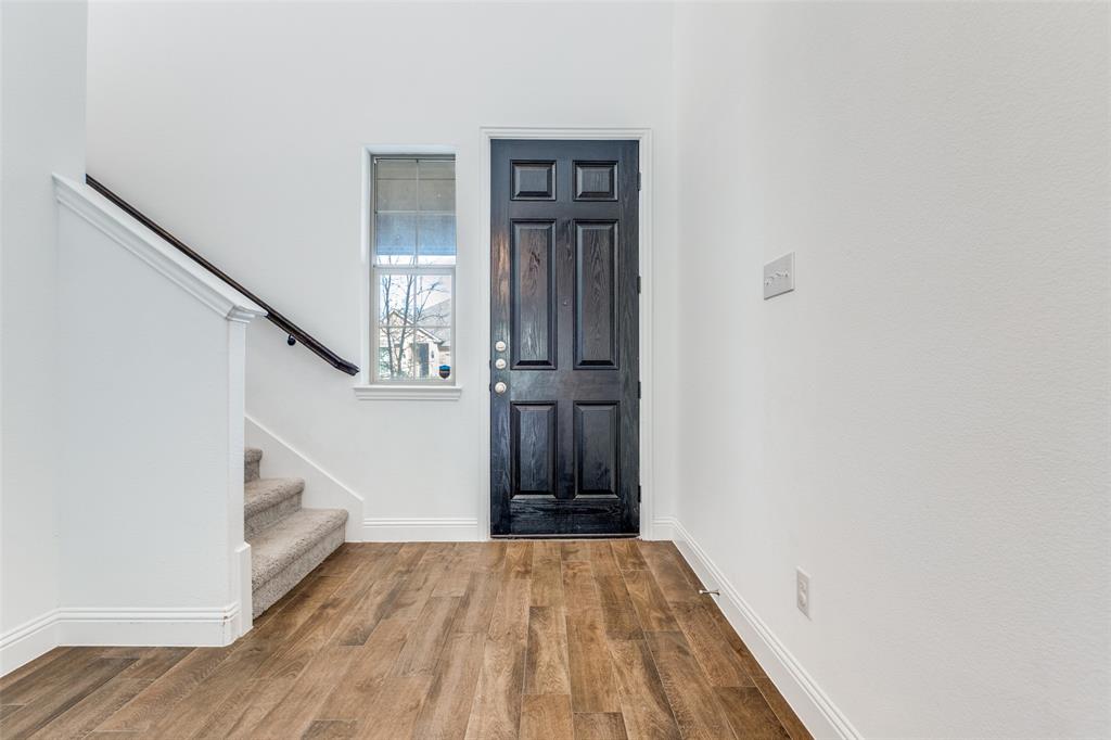 1400 Elizabeth Street Anna, TX 75409 - Photo 2 of 25 a view of an entryway with wooden floor
