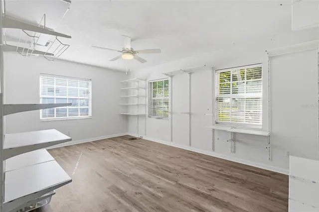 a view of a hallway with washer and dryer