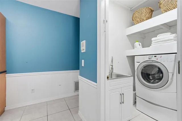 a view of a backyard with swimming pool