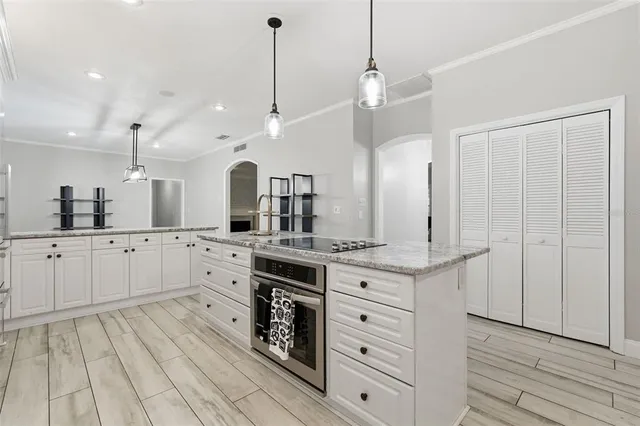 a room with wooden floor and window