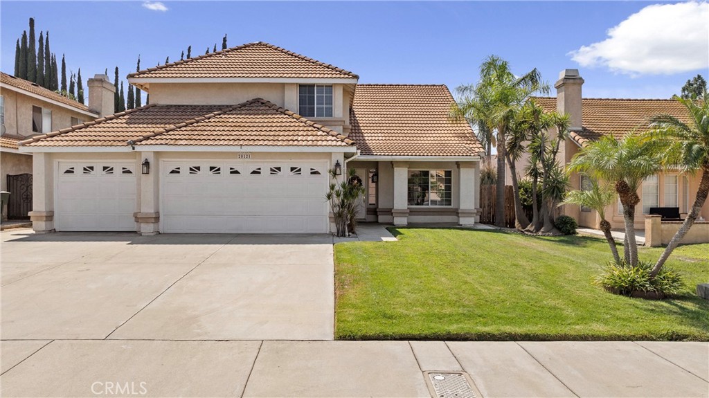 20121 Whiterock Lane Riverside, CA 92508 - Photo 1 of 1 a front view of a house with garden