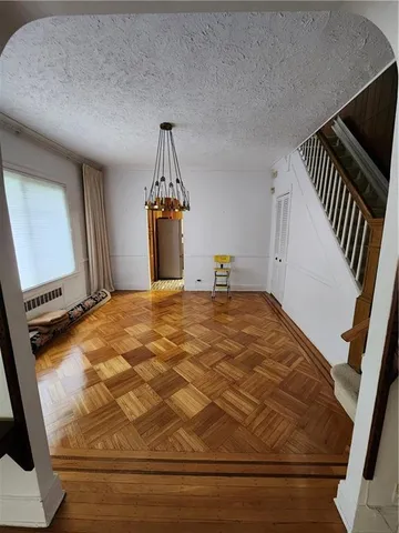 a bedroom with a bed and a mirror