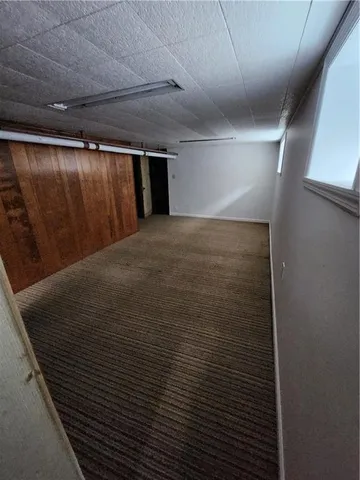 a view of a livingroom with wooden floor