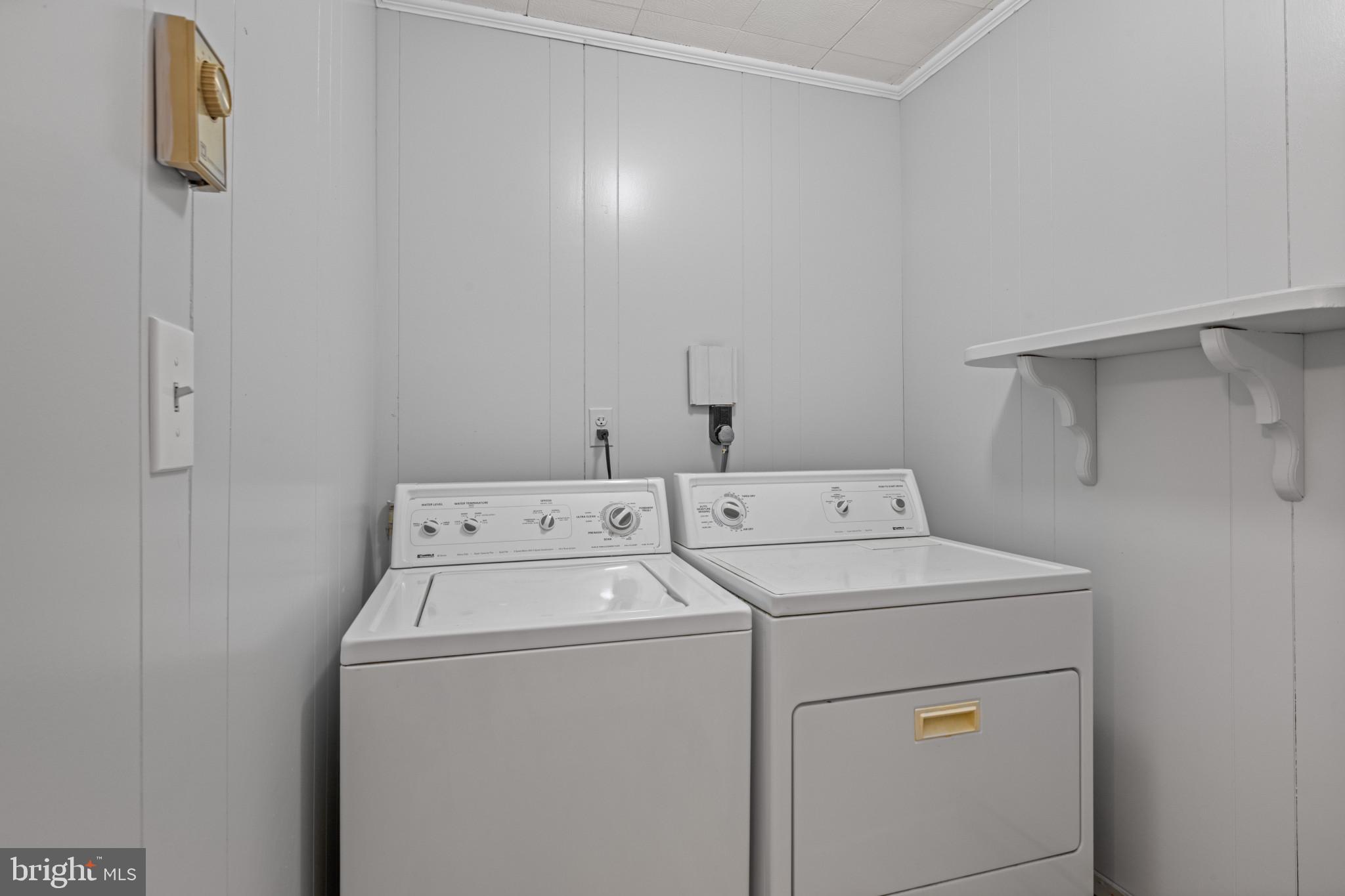 301 3rd Street Baltimore, MD 21206 - Photo 16 of 25 a utility room with dryer and washer