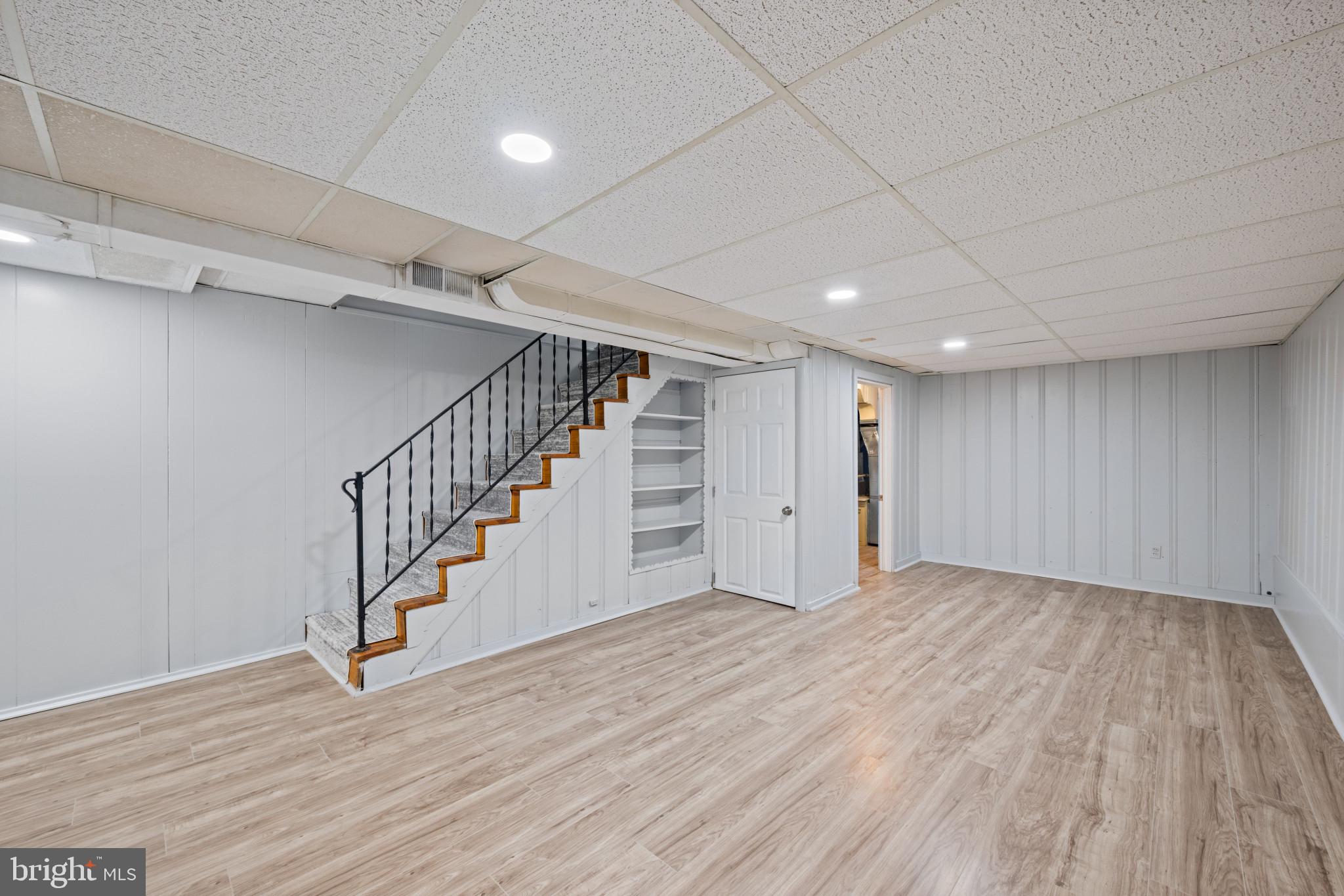 301 3rd Street Baltimore, MD 21206 - Photo 17 of 25 a view of an empty room with wooden floor
