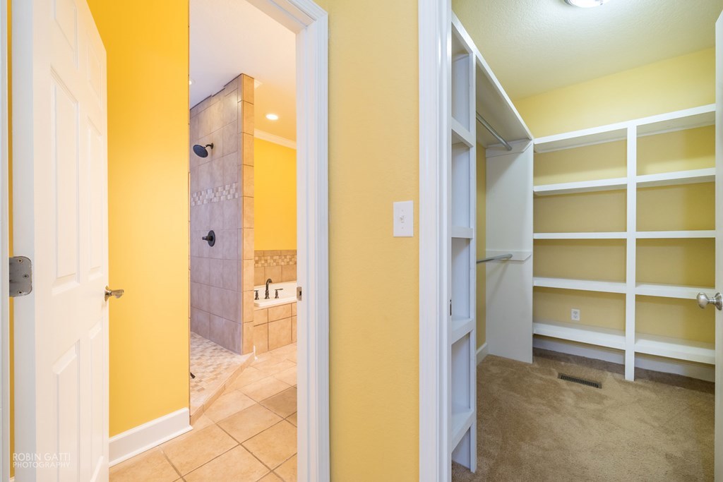 905 Blue Store Road Forsyth, GA 31029 - Photo 14 of 30 a view of a bathroom with a tub