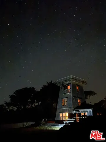 a front view of a house with yard