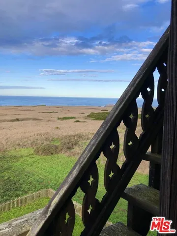 a view of a roof deck with couches