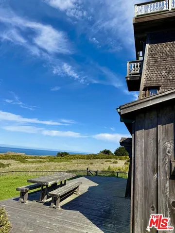 a aerial view of a house with a big yard