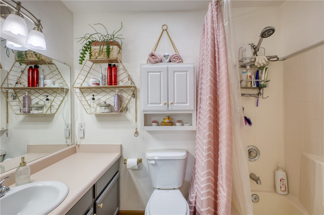 3400 Sunriver Road, Unit D2 Bullhead City, AZ 86429 - Photo 22 of 61 Bathroom featuring a vanity with an integrated sink, a mirror, and overhead lighting