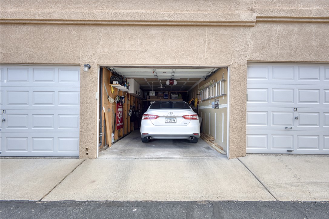 3400 Sunriver Road, Unit D2 Bullhead City, AZ 86429 - Photo 46 of 61 The property offers a garage with a white panel door and concrete driveway