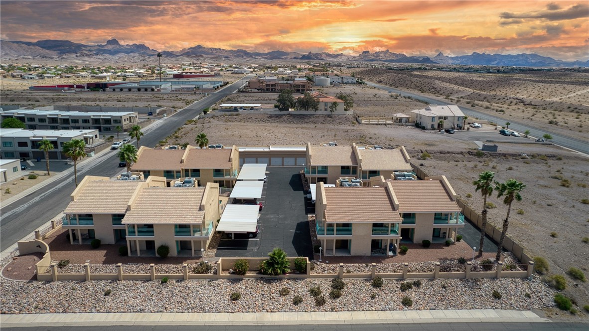 3400 Sunriver Road, Unit D2 Bullhead City, AZ 86429 - Photo 50 of 61 Aerial view of the property, featuring a desert landscape with mountains in the background