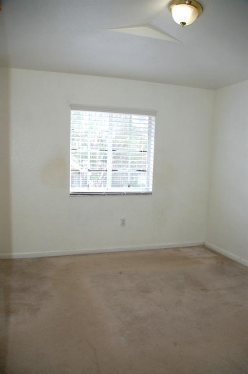 18713 Southwest 26th Street Miramar, FL 33029 - Photo 15 of 32 an empty room with a window