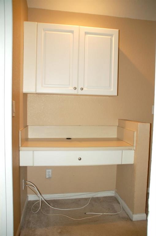 18713 Southwest 26th Street Miramar, FL 33029 - Photo 17 of 32 a view of a room with wooden floor and cabinet