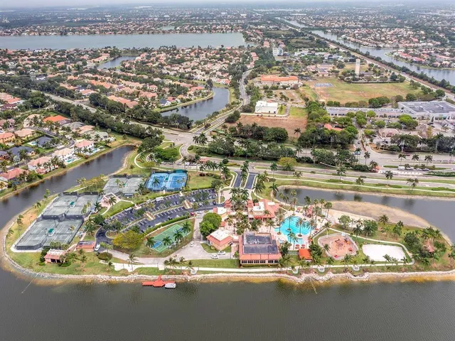 an aerial view of a city with streets and houses