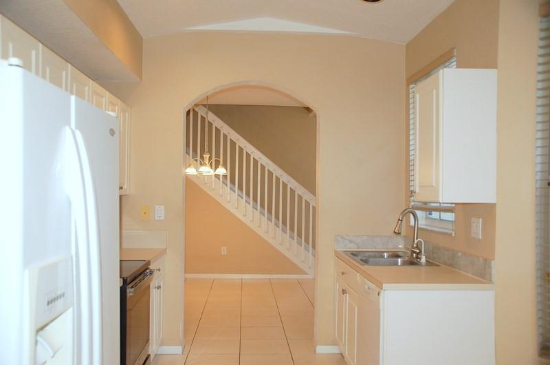 18713 Southwest 26th Street Miramar, FL 33029 - Photo 3 of 32 a bathroom with a sink and a mirror
