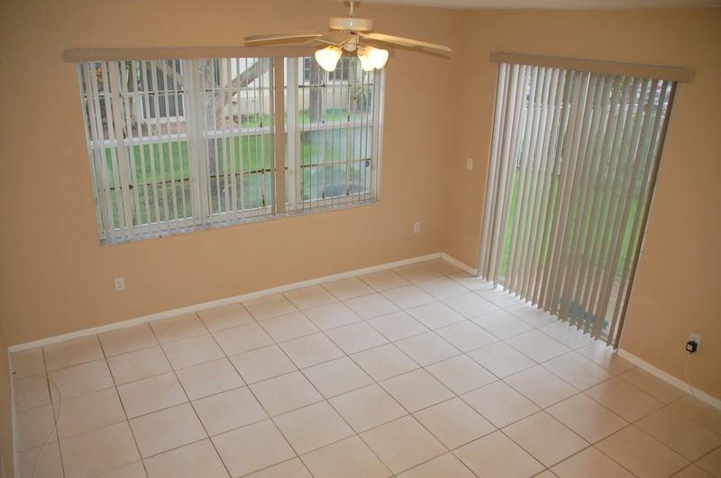 18713 Southwest 26th Street Miramar, FL 33029 - Photo 5 of 32 a view of an empty room with a window