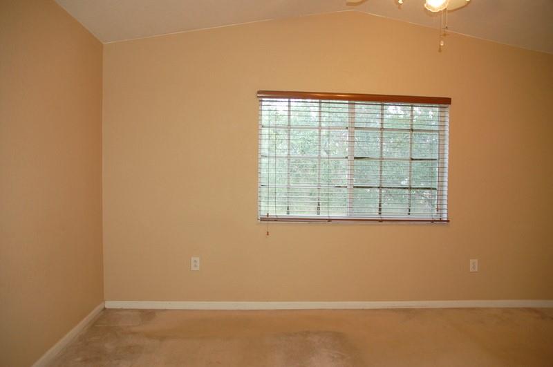 18713 Southwest 26th Street Miramar, FL 33029 - Photo 9 of 32 an empty room with a window
