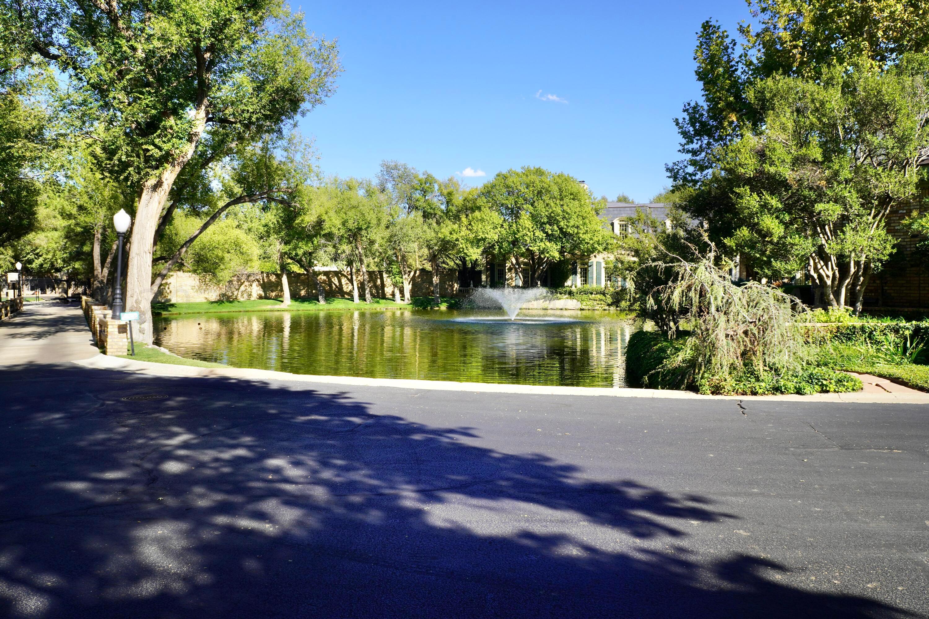 22 Edgewater Drive Amarillo, TX 79106 - Photo 47 of 52 a view of a lake with a yard