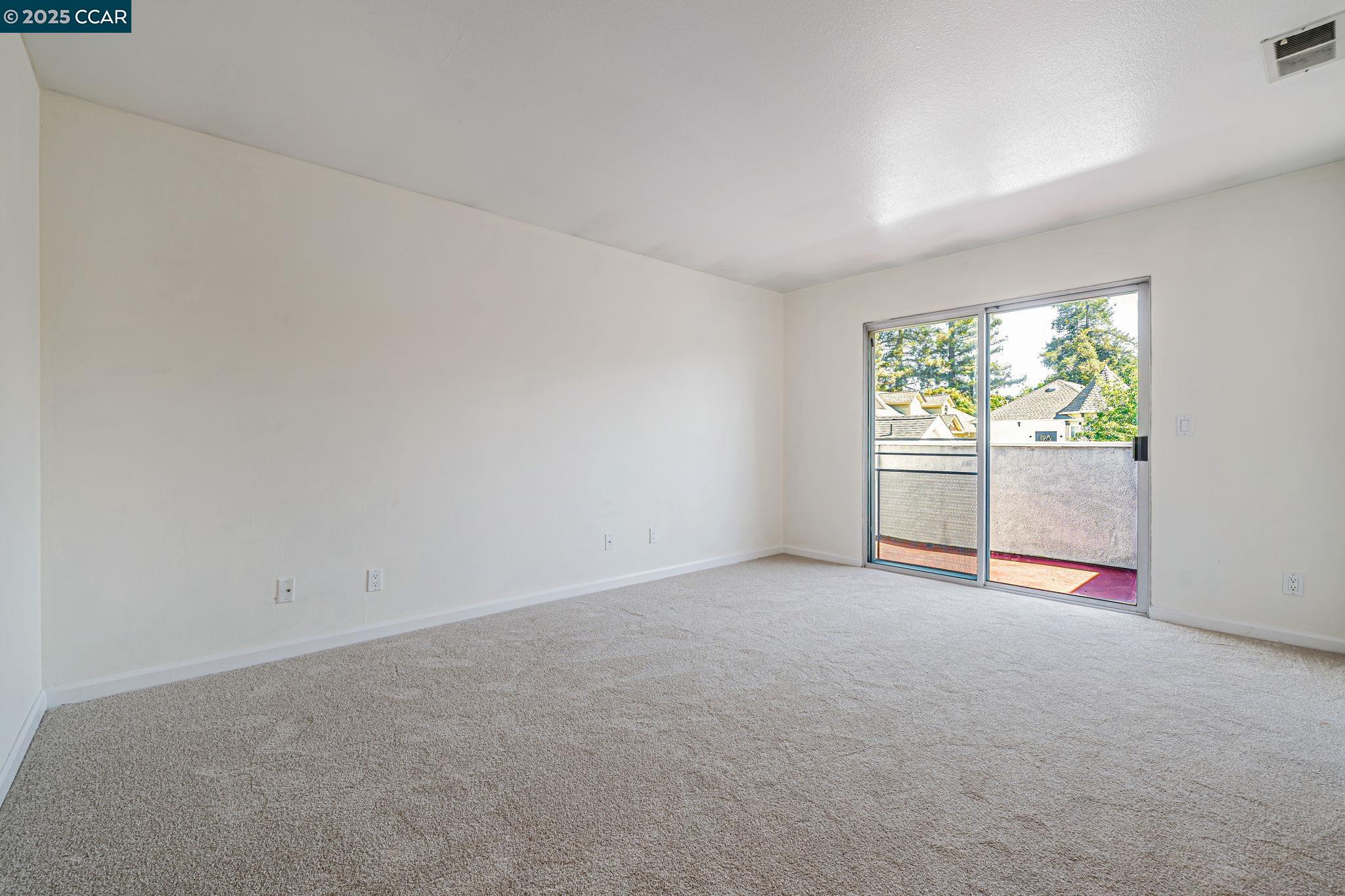 68 Peters Avenue, Unit 6 Pleasanton, CA 94566 - Photo 20 of 40 an empty room with windows