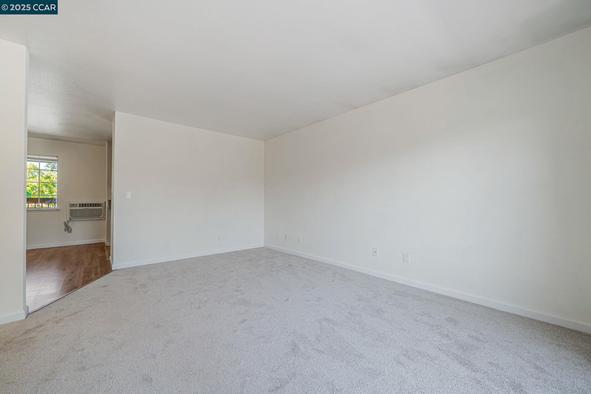 68 Peters Avenue, Unit 6 Pleasanton, CA 94566 - Photo 24 of 40 a view of an empty room and a window