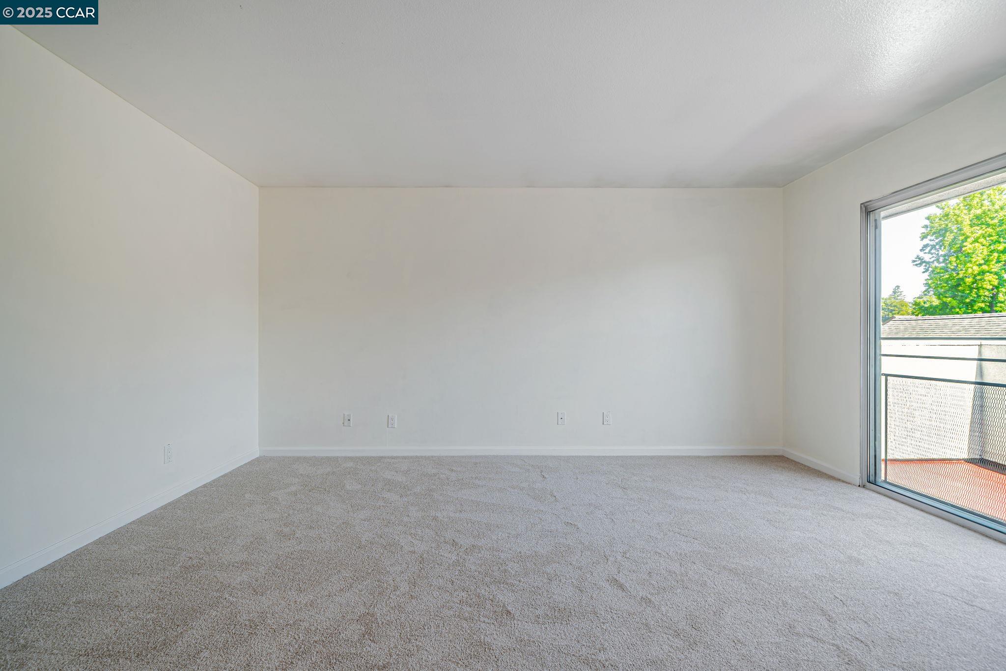 68 Peters Avenue, Unit 6 Pleasanton, CA 94566 - Photo 25 of 40 an empty room with a window