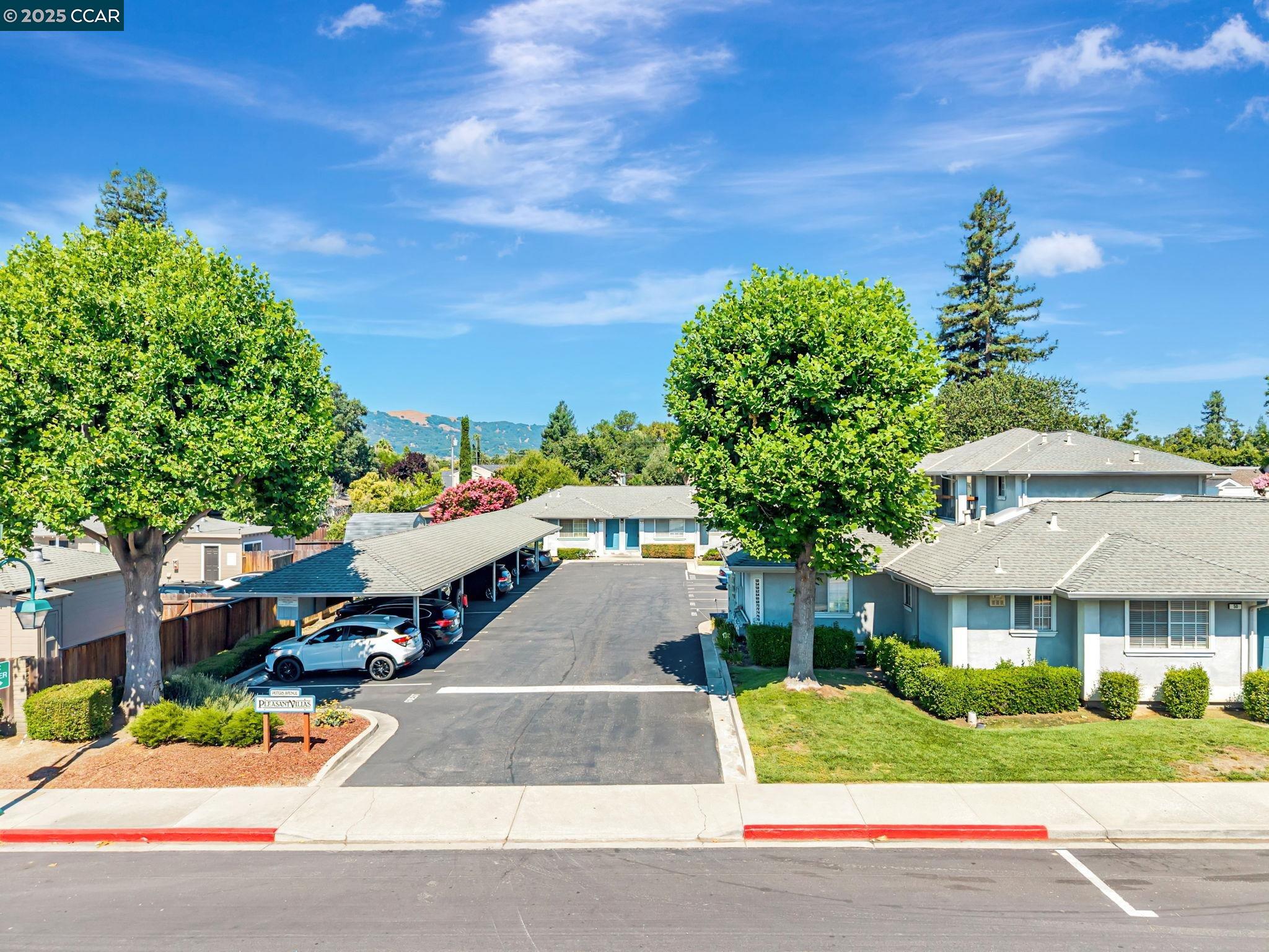 68 Peters Avenue, Unit 6 Pleasanton, CA 94566 - Photo 31 of 40 a aerial view of a house with a yard and potted plants