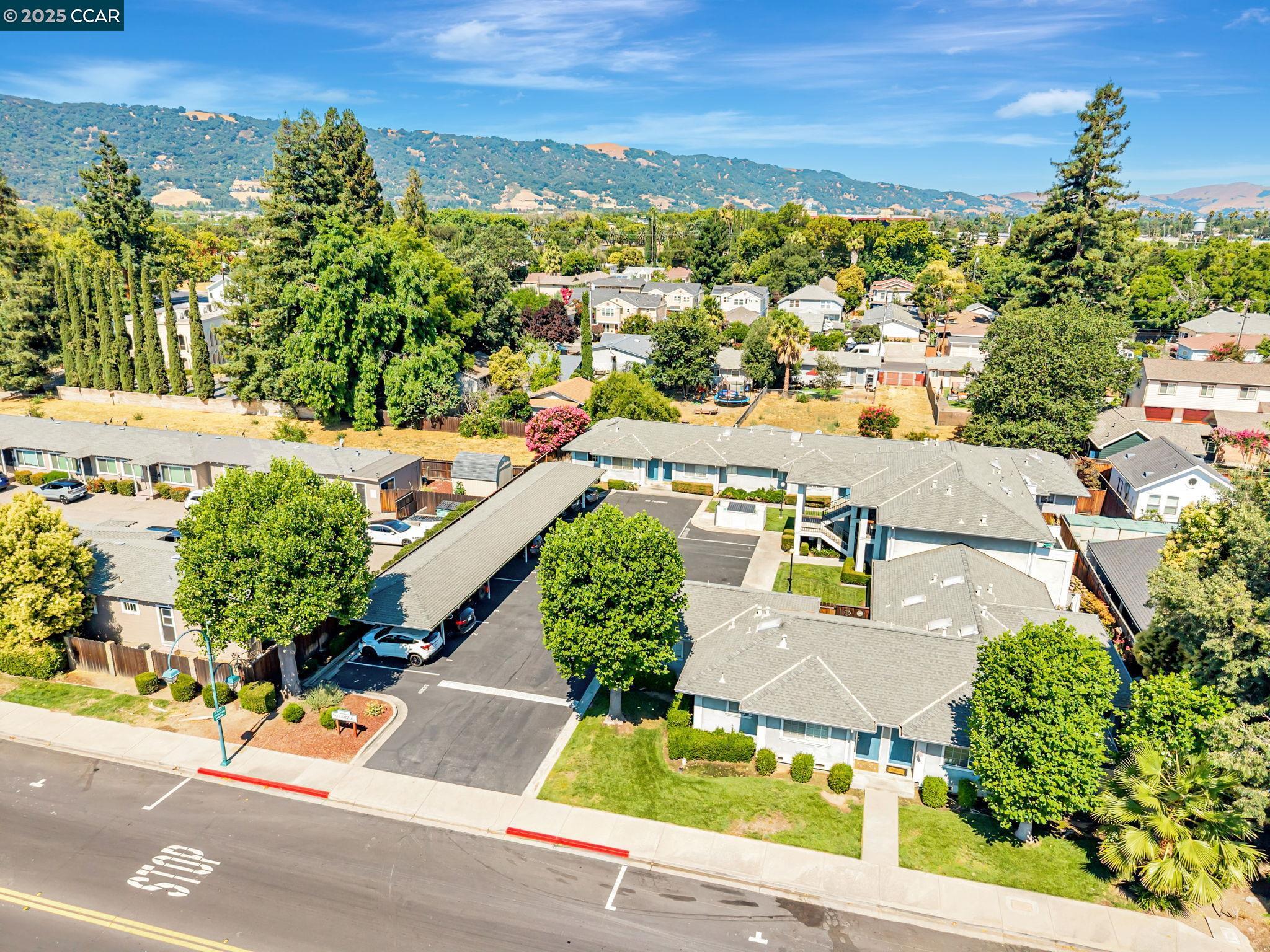 68 Peters Avenue, Unit 6 Pleasanton, CA 94566 - Photo 34 of 40 an aerial view of a house with a garden