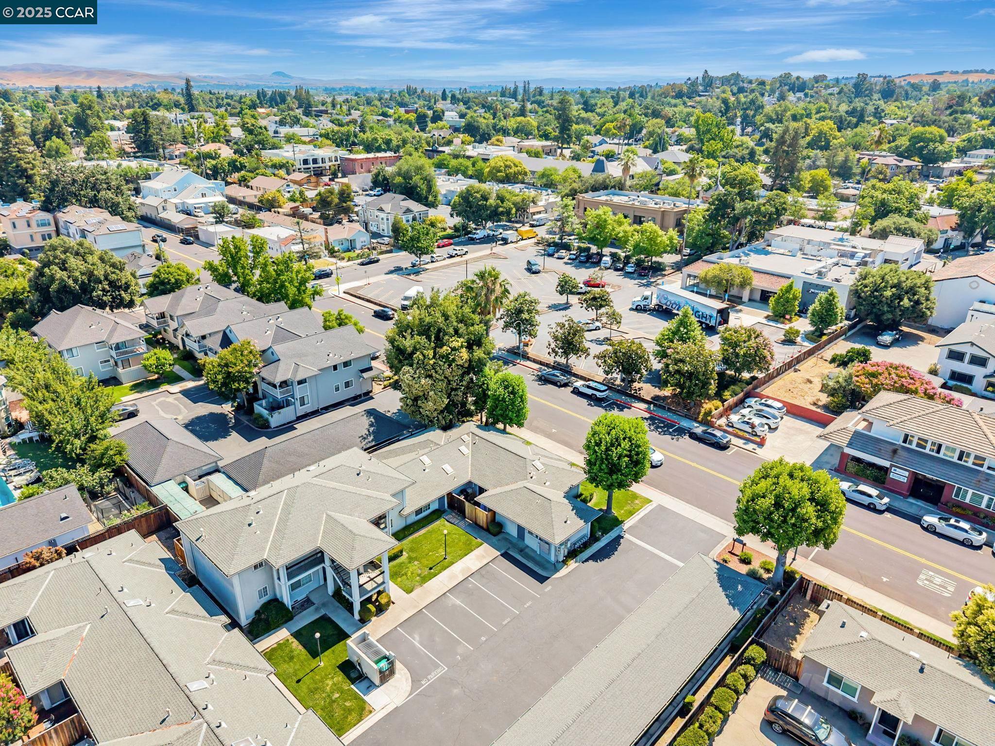 68 Peters Avenue, Unit 6 Pleasanton, CA 94566 - Photo 37 of 40 an aerial view of a house with a yard