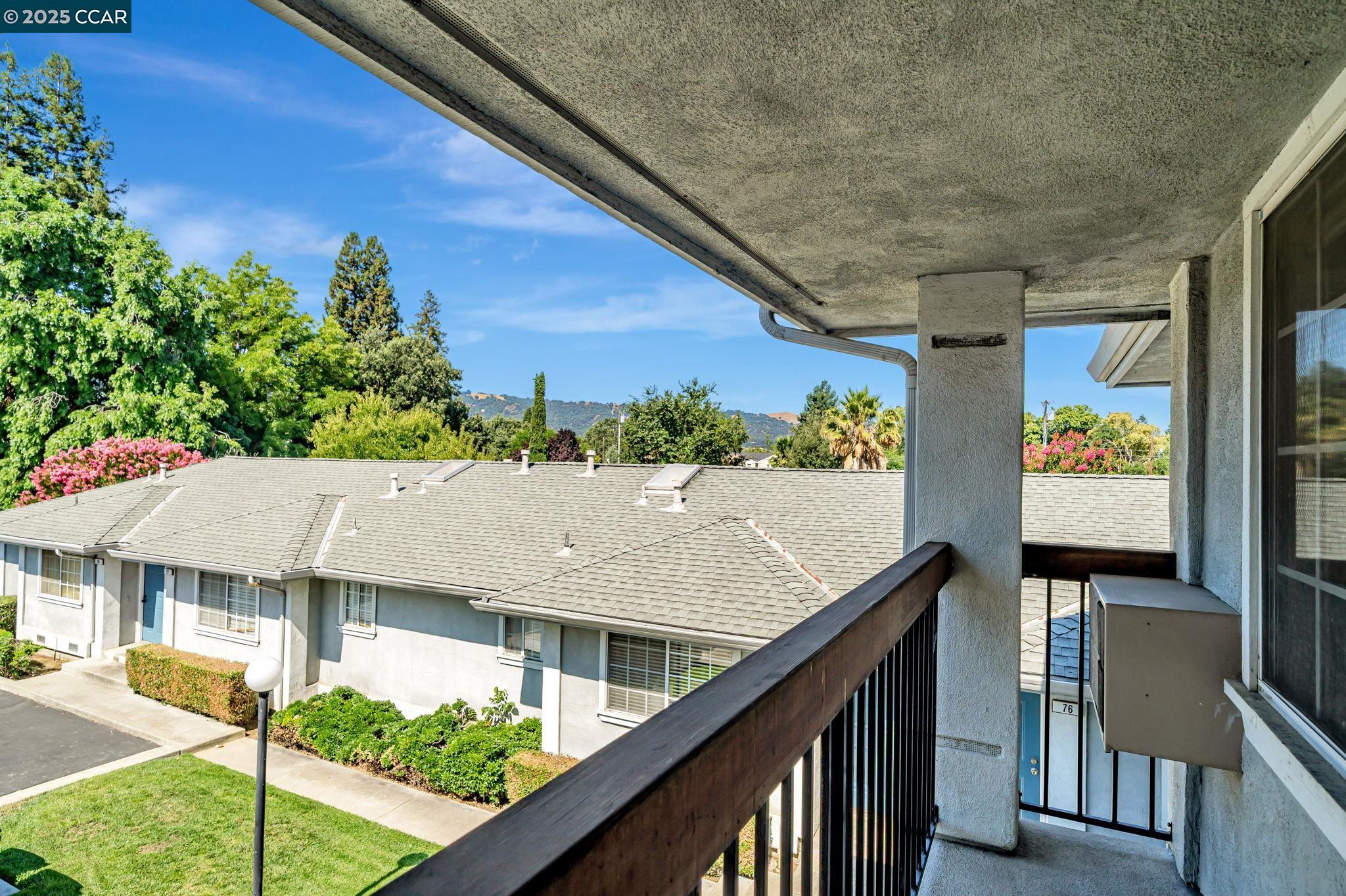 68 Peters Avenue, Unit 6 Pleasanton, CA 94566 - Photo 5 of 40 a balcony view with an outdoor seating