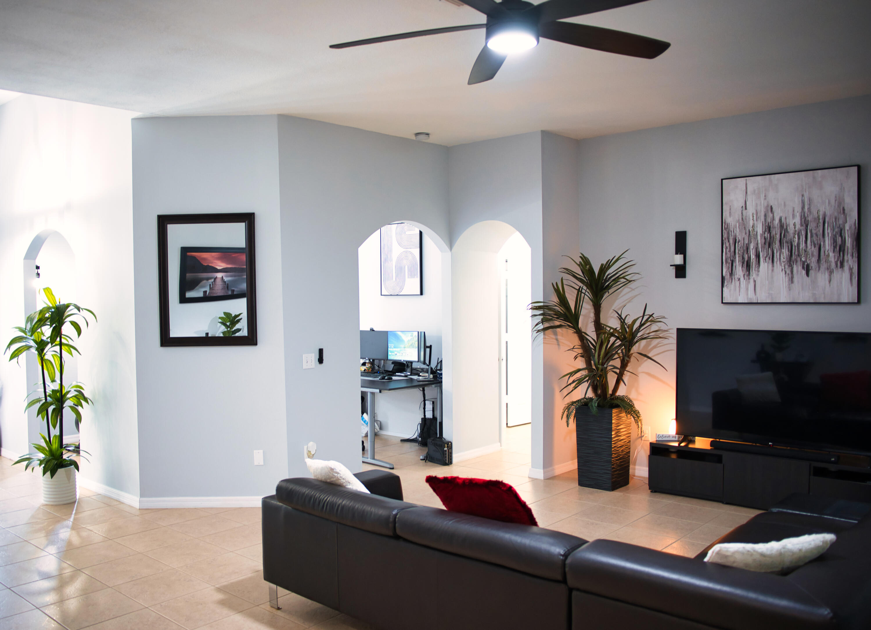 315 Kaye Street Fort Pierce, FL 34947 - Photo 13 of 66 a living room with furniture and a flat screen tv