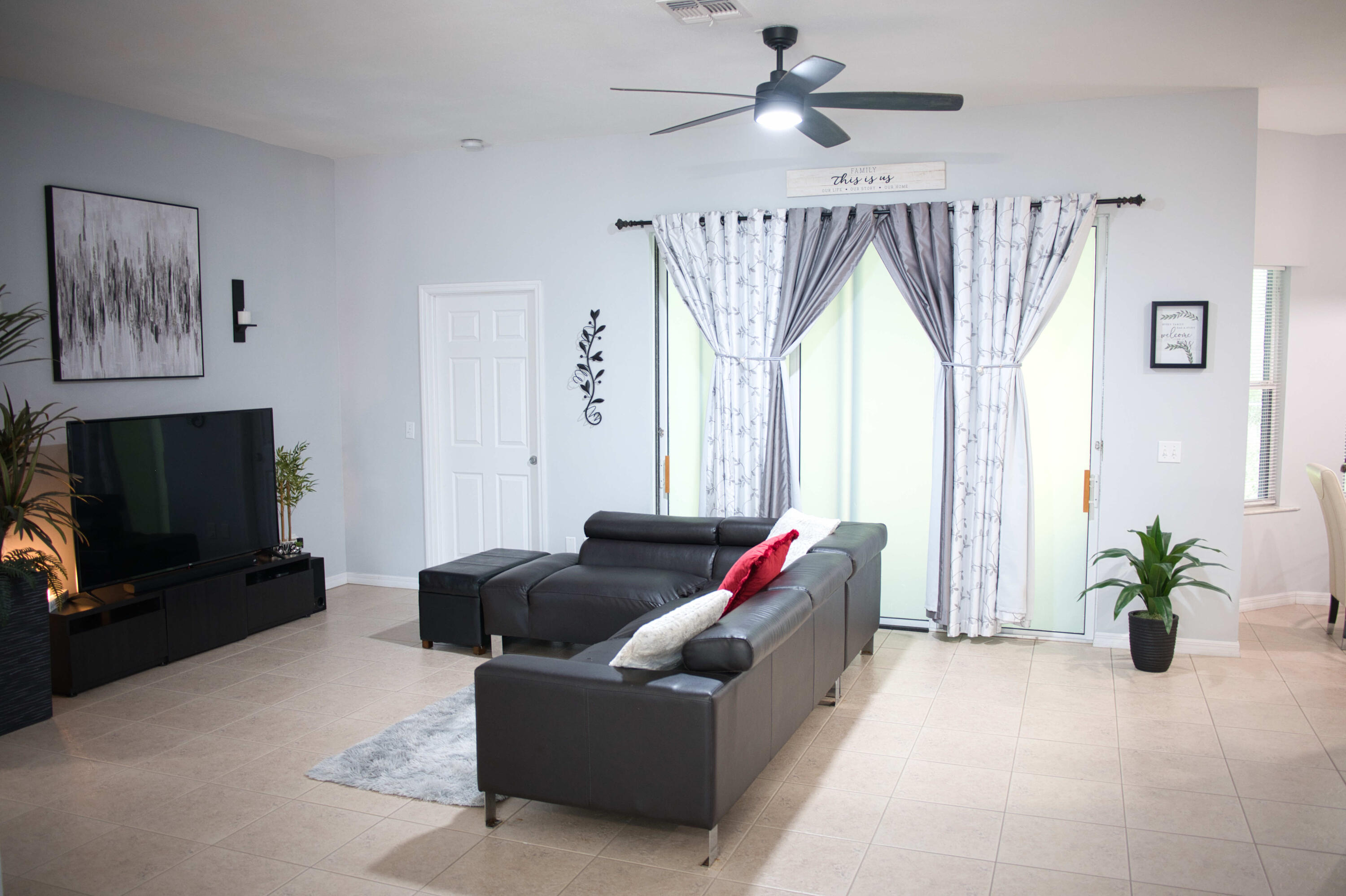 315 Kaye Street Fort Pierce, FL 34947 - Photo 16 of 66 a living room with furniture and a flat screen tv