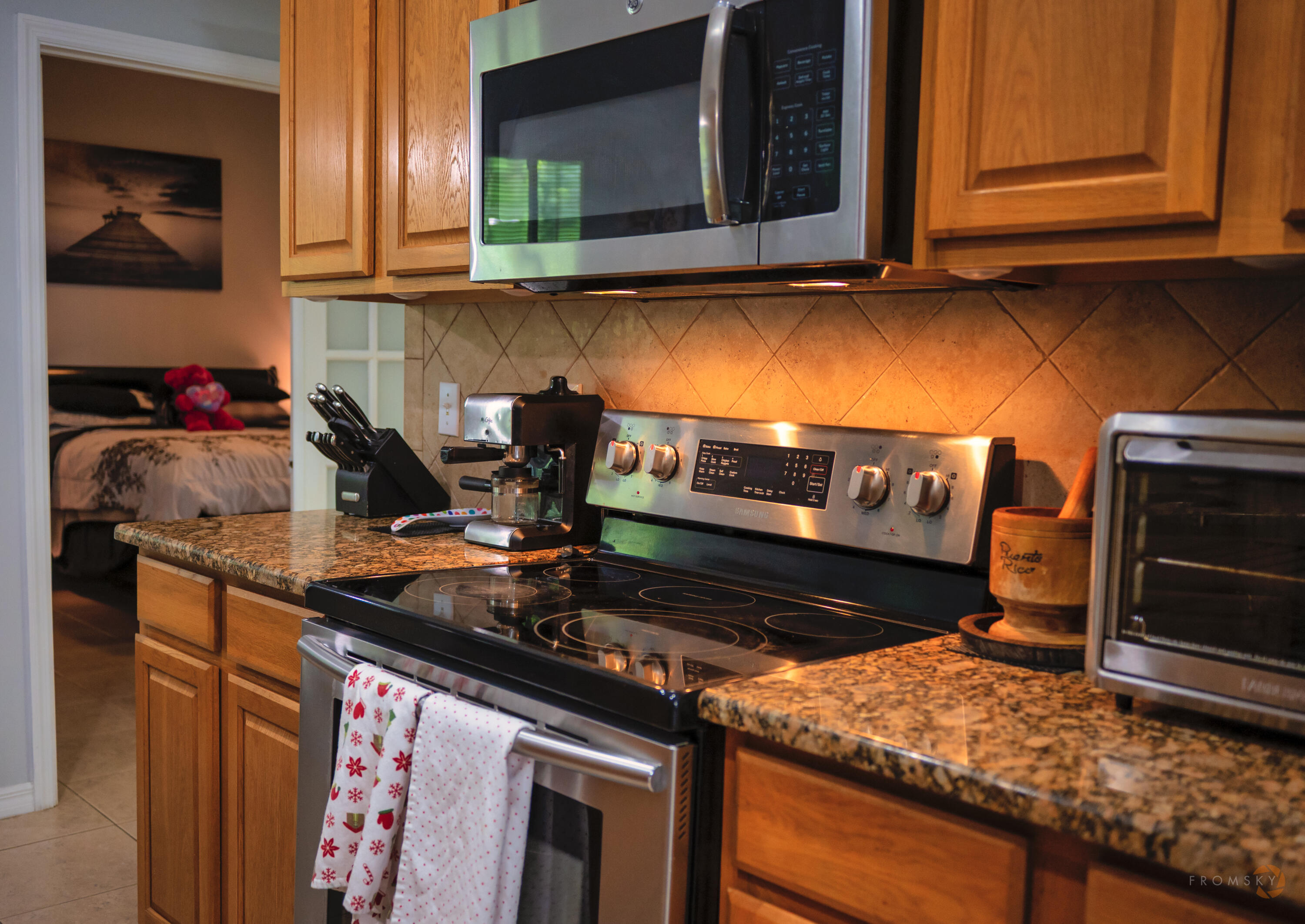 315 Kaye Street Fort Pierce, FL 34947 - Photo 22 of 66 a kitchen with a stove and a microwave