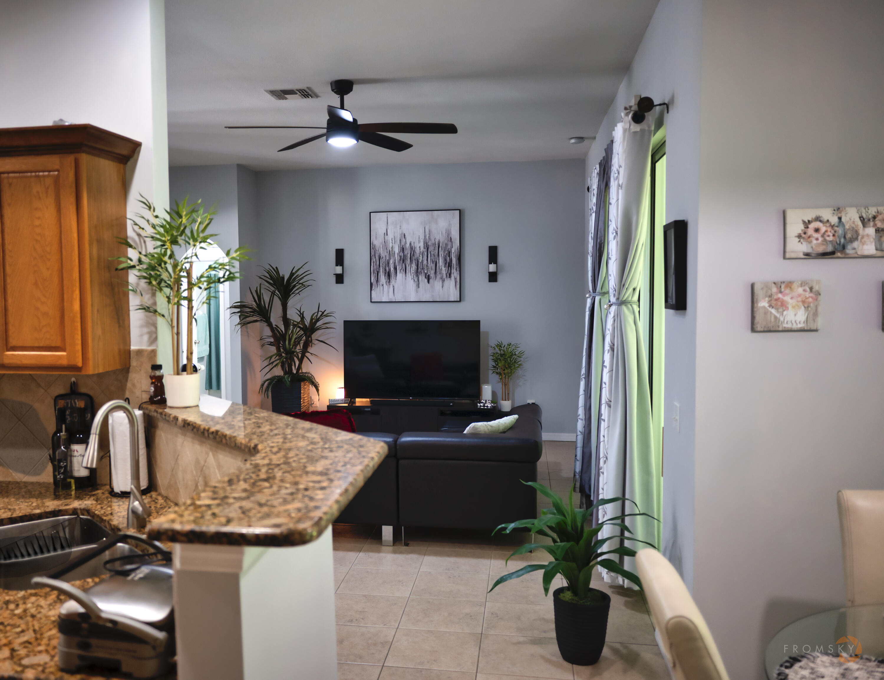 315 Kaye Street Fort Pierce, FL 34947 - Photo 24 of 66 a living room with furniture flowerpot and a chandelier