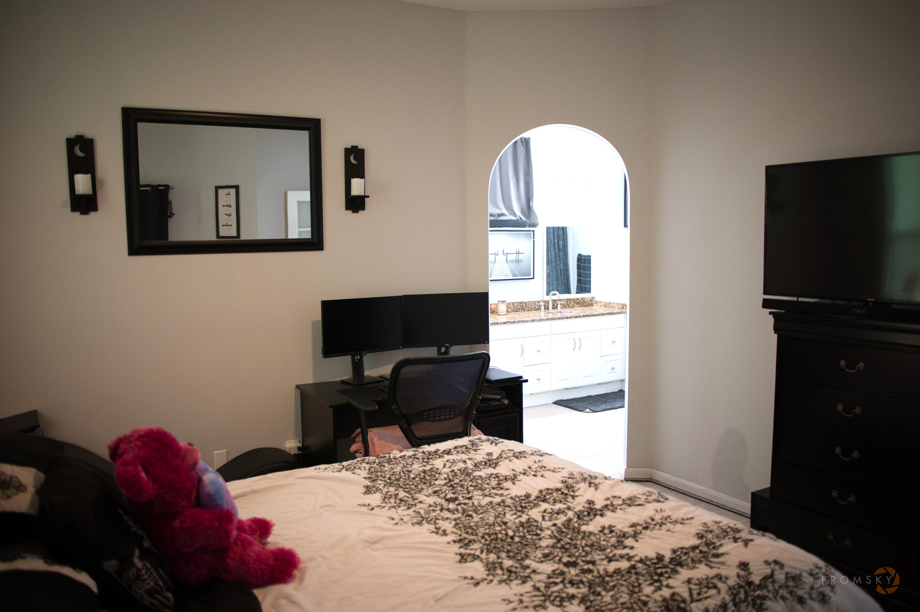 315 Kaye Street Fort Pierce, FL 34947 - Photo 34 of 66 a bedroom with a bed and a flat screen tv