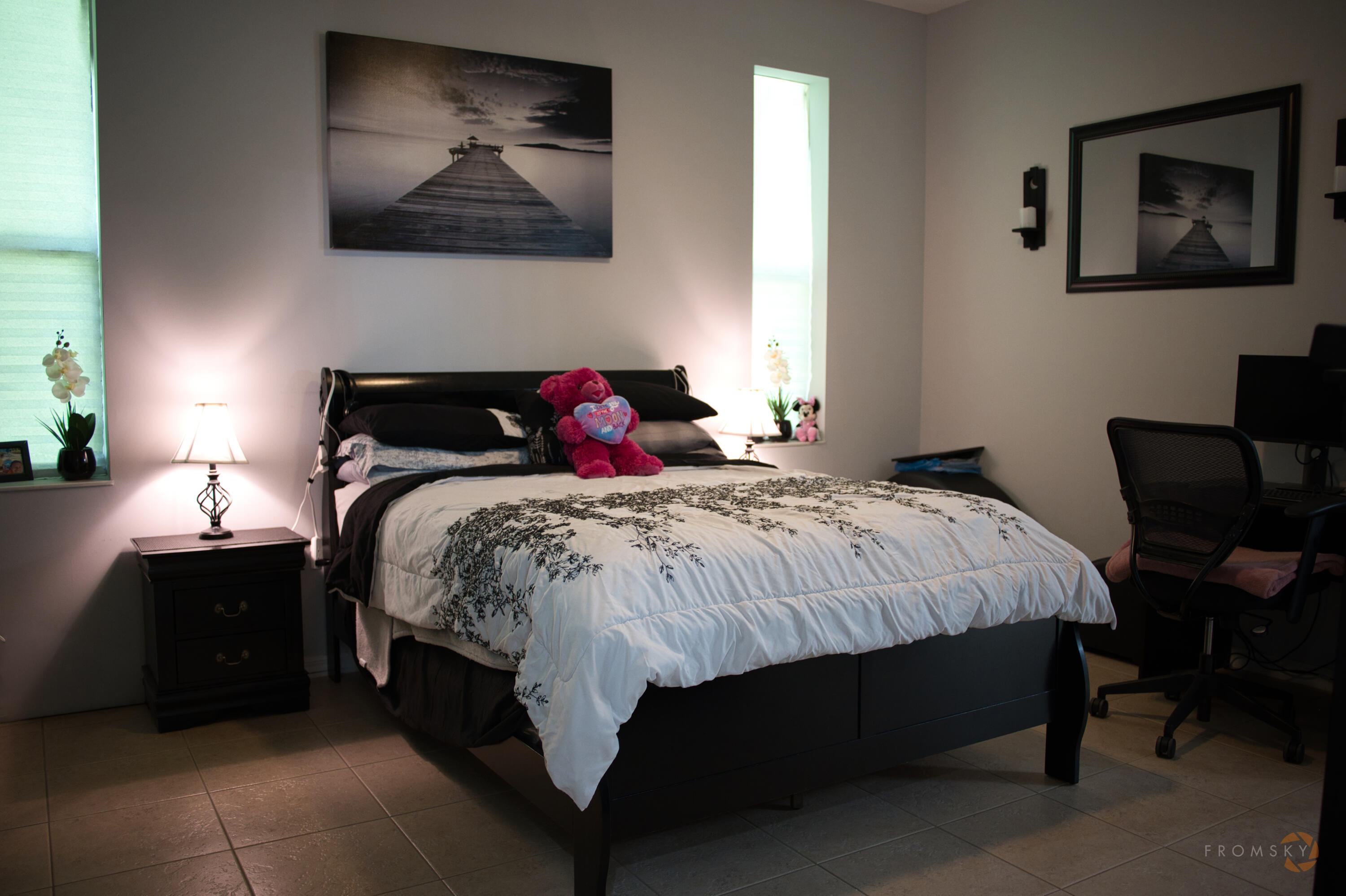 315 Kaye Street Fort Pierce, FL 34947 - Photo 35 of 66 a bedroom with a bed and chair