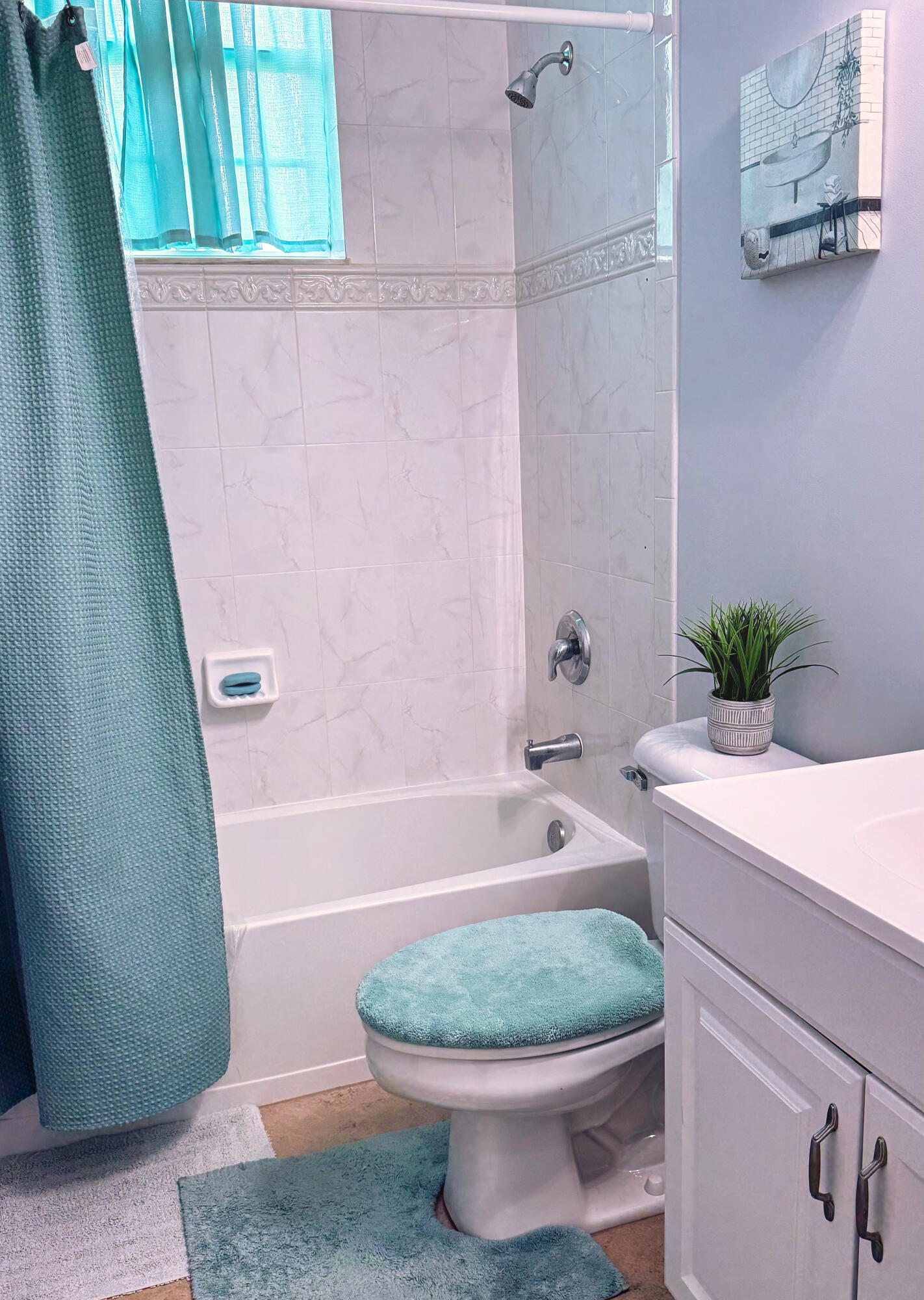 315 Kaye Street Fort Pierce, FL 34947 - Photo 45 of 66 a bathroom with a sink and bathtub