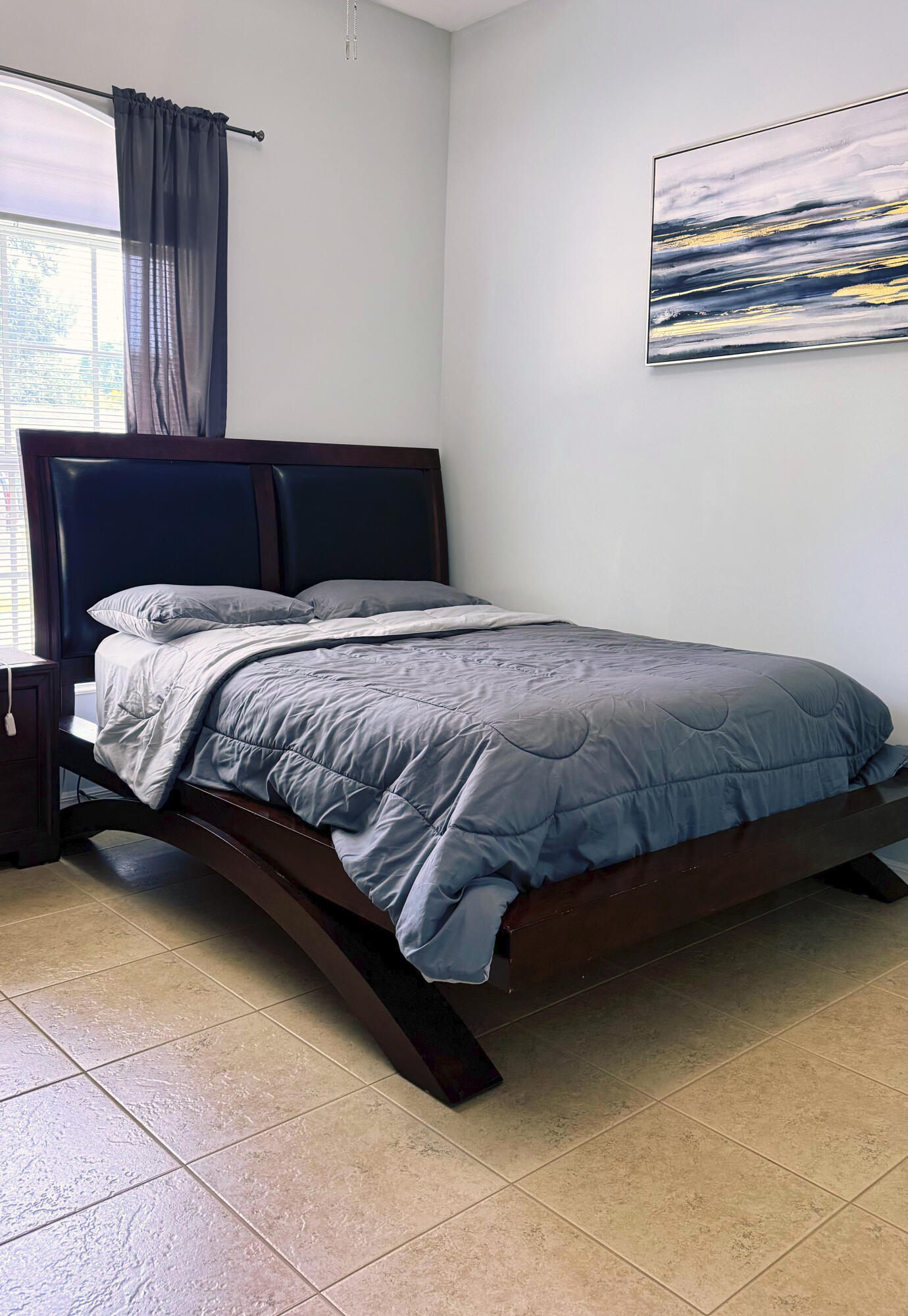 315 Kaye Street Fort Pierce, FL 34947 - Photo 47 of 66 a bedroom with a bed and window