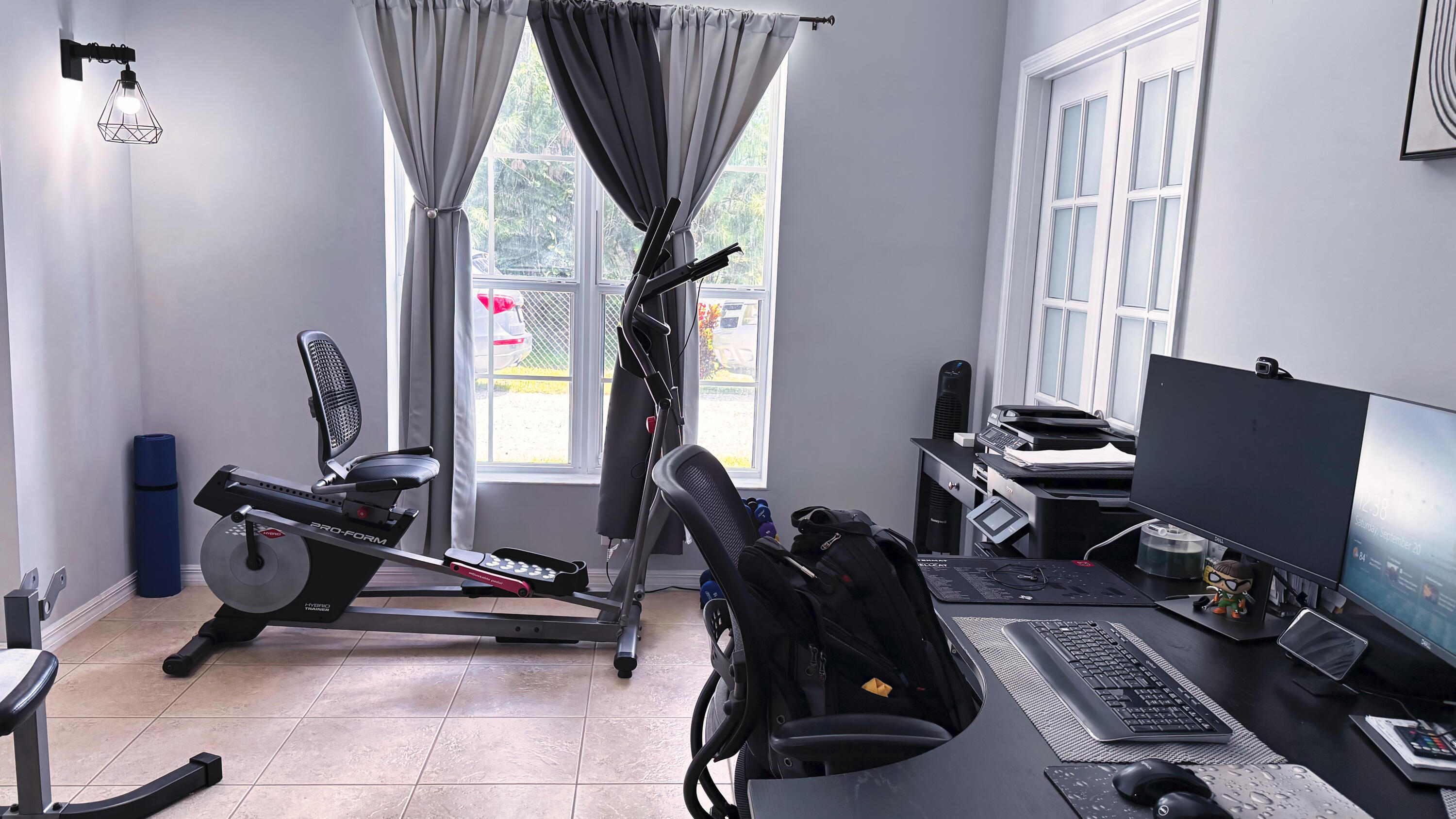 315 Kaye Street Fort Pierce, FL 34947 - Photo 54 of 66 a room with gym equipment and a large window