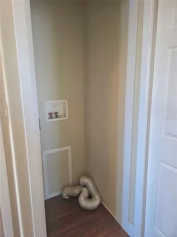 a wooden floor in a gallery