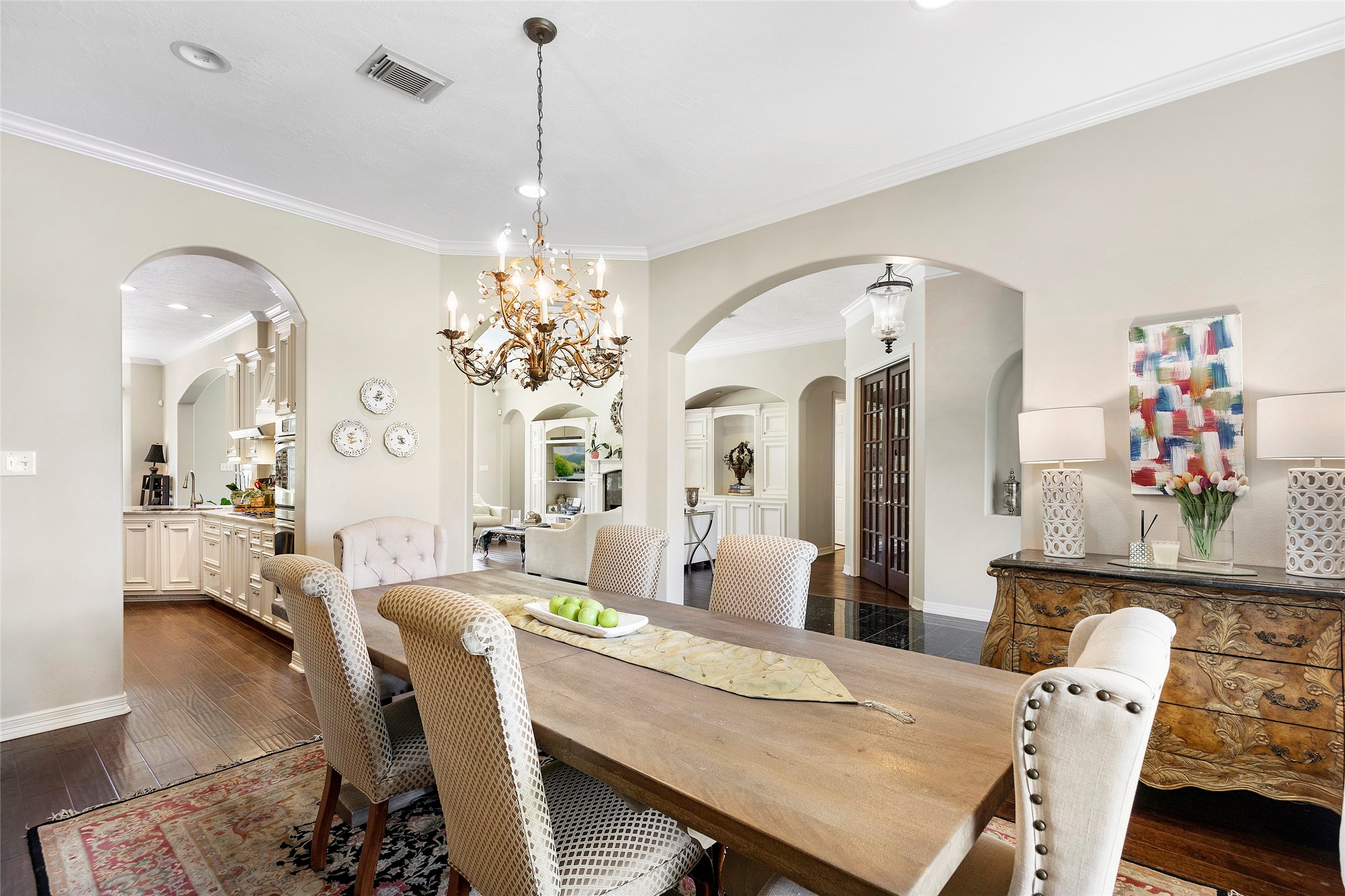 6530 Treaschwig Road, Unit 1 Spring, TX 77373 - Photo 7 of 32 a view of a dining room with furniture and chandelier