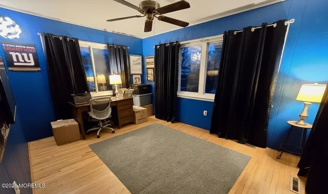 a bathroom with a toilet sink and shower